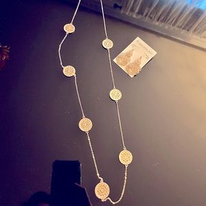 Brand new rose gold color necklace and earrings